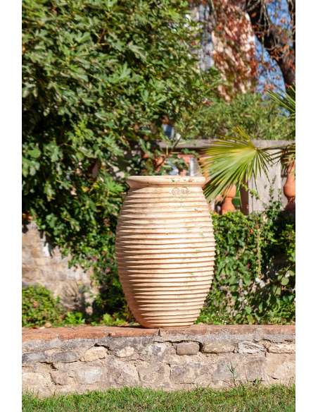 Olive shape striated Biot jar antique patina finish